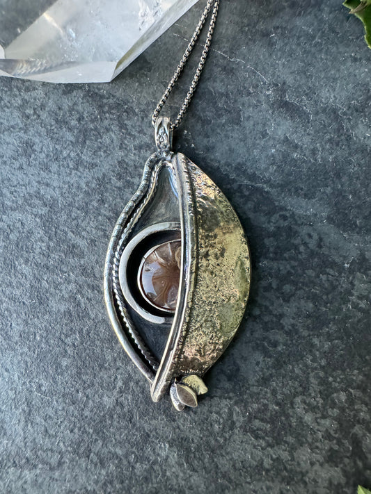 3rd eye petrified pinecone pendant